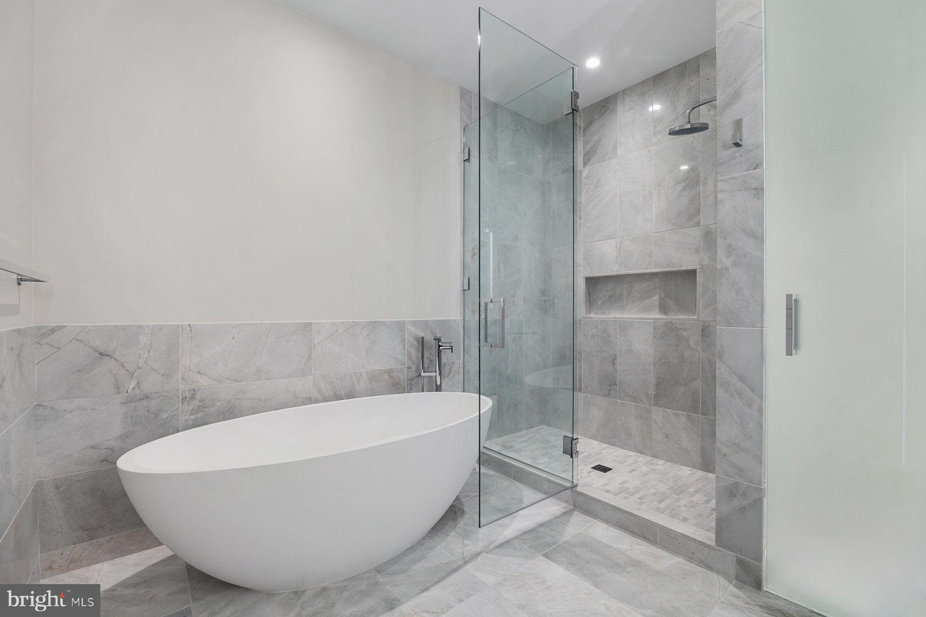 301 South Broad Street, Unit 1902 Philadelphia, PA 19107 - Photo 24 of 44 a bathroom with a bathtub and shower