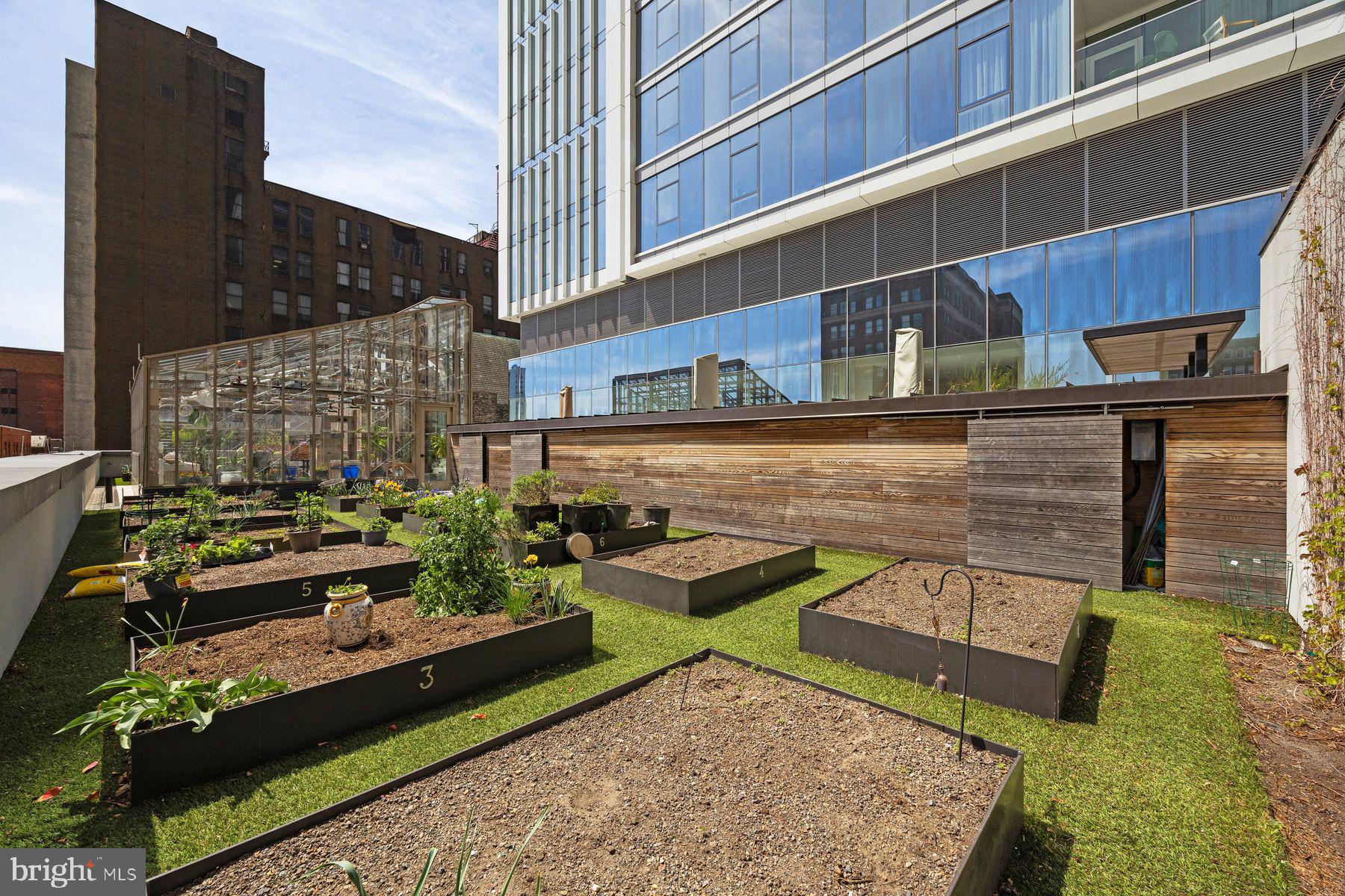 301 South Broad Street, Unit 1902 Philadelphia, PA 19107 - Photo 32 of 44 a view of two chairs and a table in the balcony