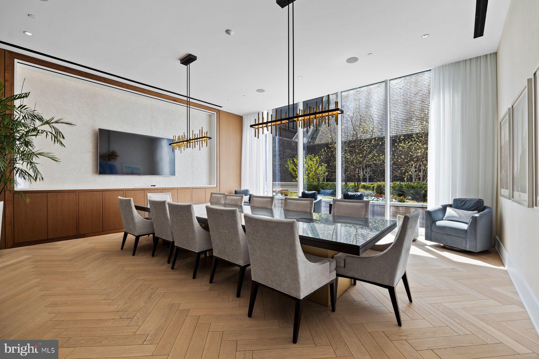 301 South Broad Street, Unit 1902 Philadelphia, PA 19107 - Photo 40 of 44 a view of a dining room with furniture window and outside view