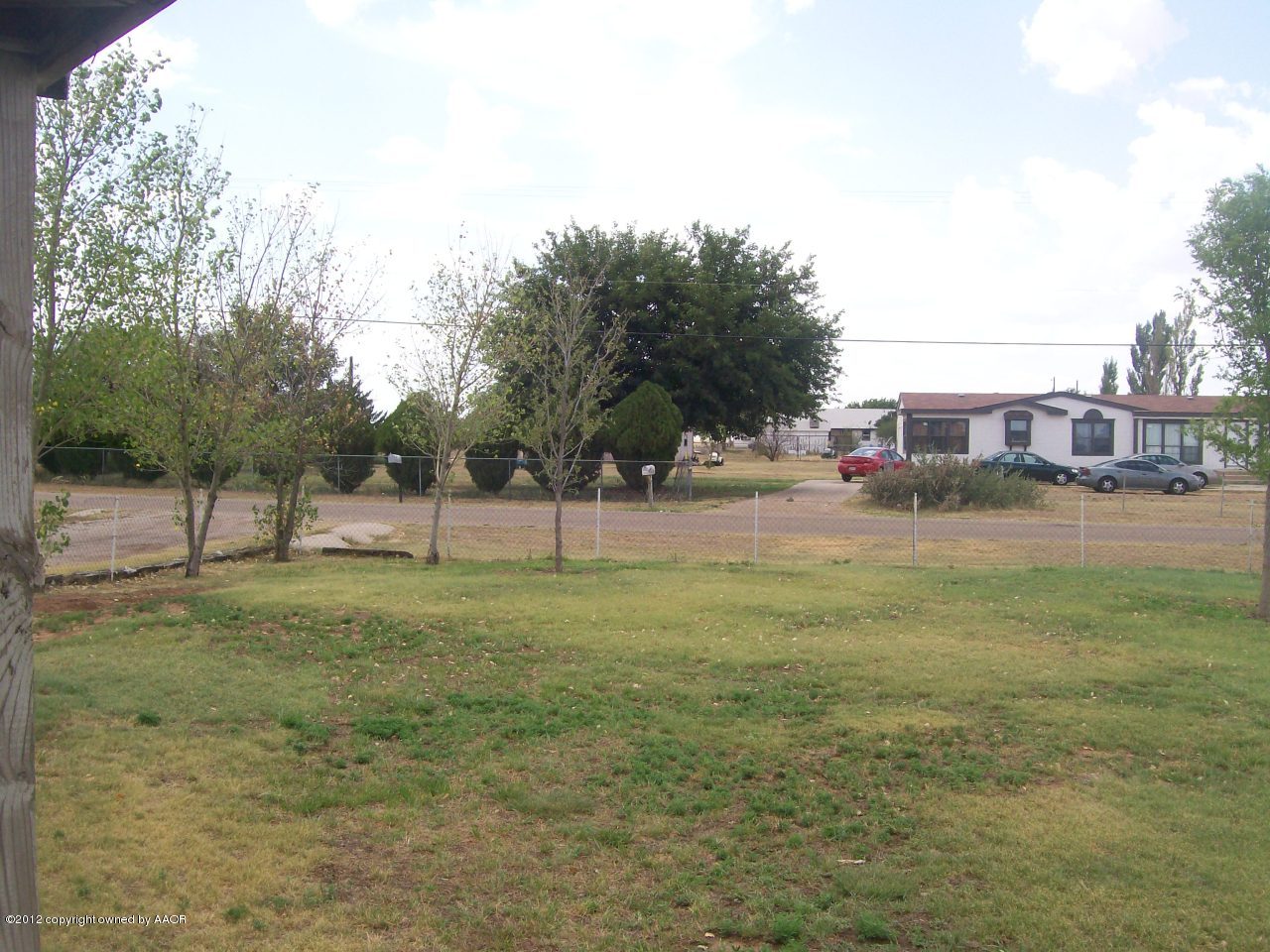 14151 Savannah Road Amarillo, TX 79118 - Photo 4 of 16 a view of a yard with a house