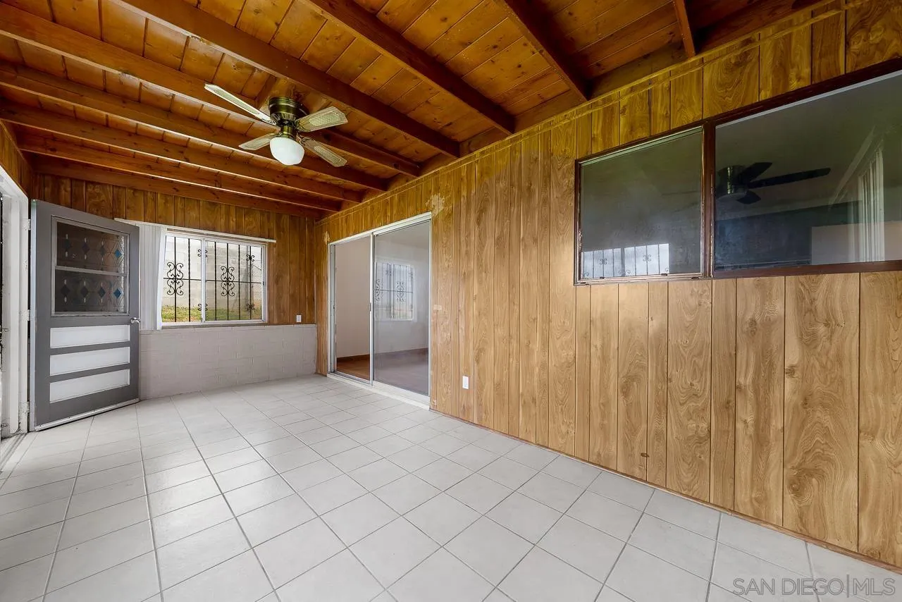 966 27th Street San Diego, CA 92154 - Photo 11 of 33 a view of an empty room with windows