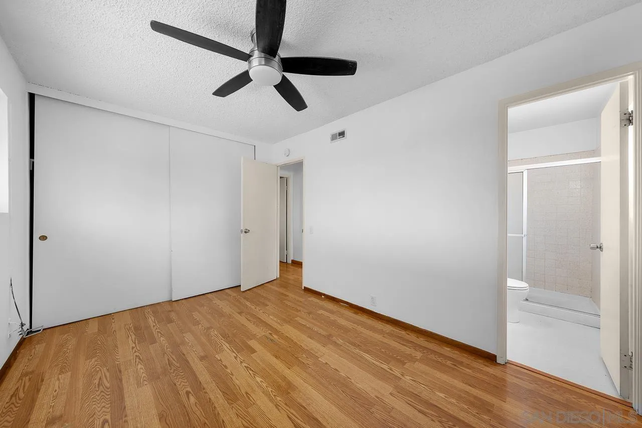 966 27th Street San Diego, CA 92154 - Photo 15 of 33 a view of empty room with wooden floor
