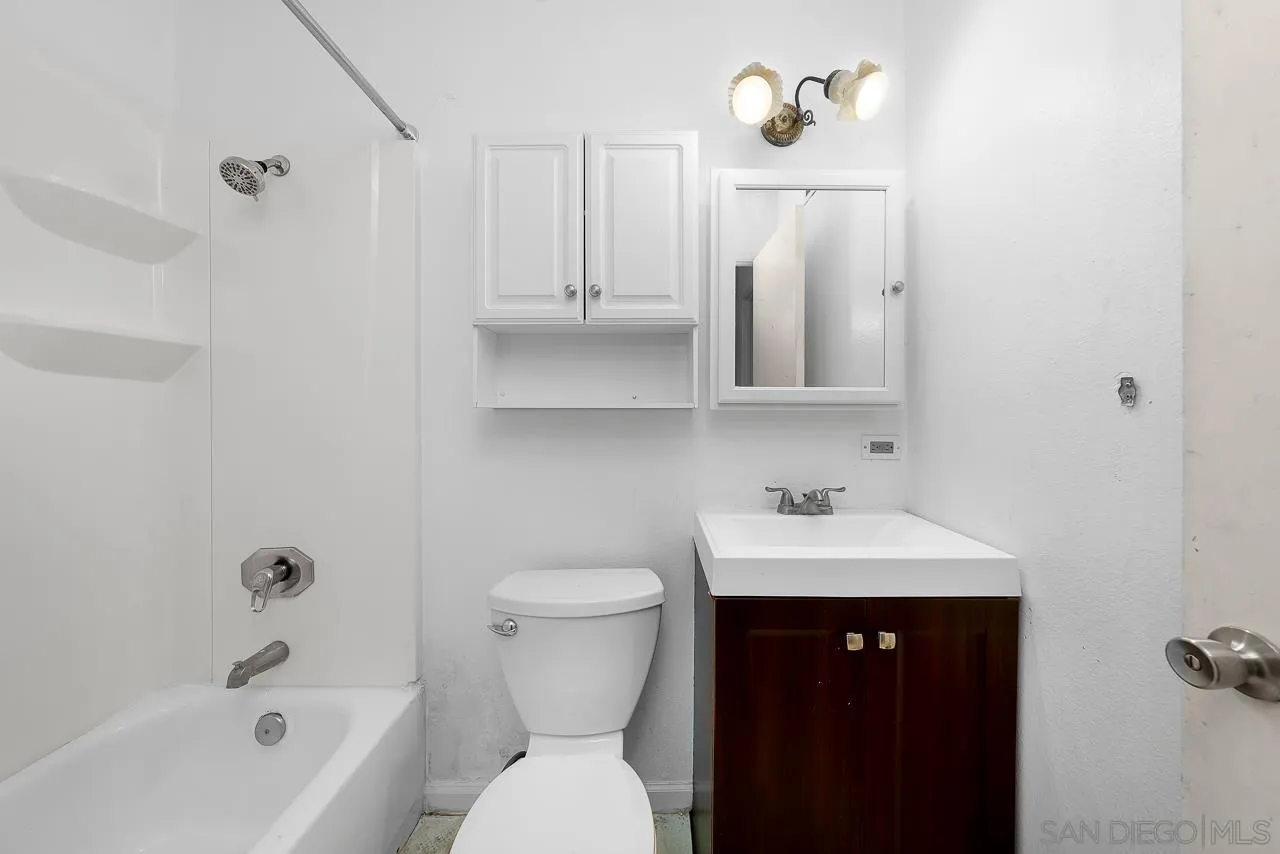 966 27th Street San Diego, CA 92154 - Photo 17 of 33 a bathroom with a sink toilet and shower