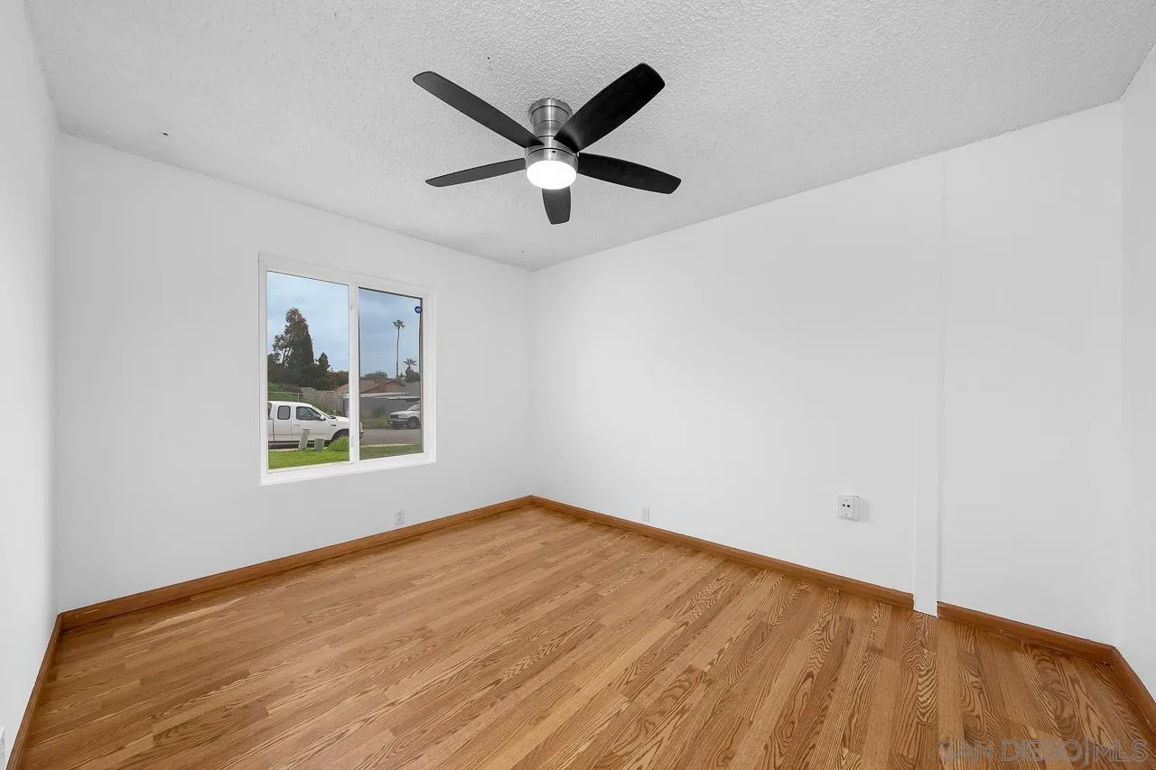 966 27th Street San Diego, CA 92154 - Photo 18 of 33 a view of an empty room with a window