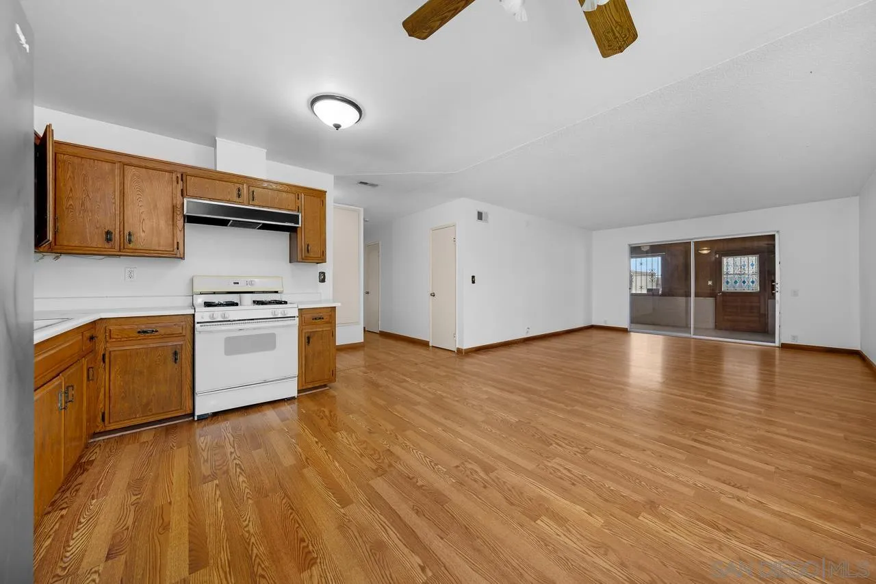 966 27th Street San Diego, CA 92154 - Photo 30 of 33 a view of kitchen and wooden floor