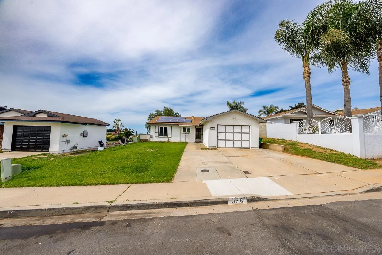 966 27th Street San Diego, CA 92154 - Photo 3 of 33 a house with a outdoor space