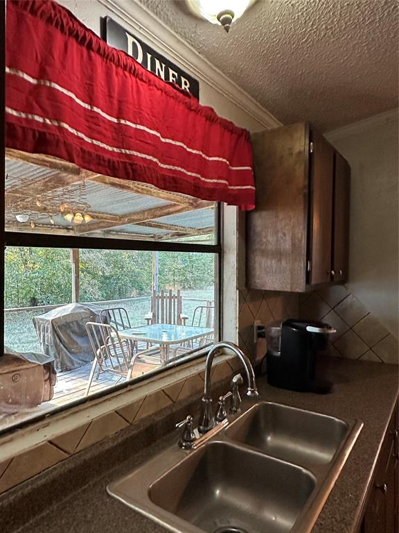1048 Red Bird Seven Points, TX 75143 - Photo 21 of 30 Kitchen view of back porch