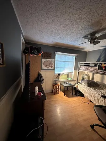 a room with furniture and gym equipment
