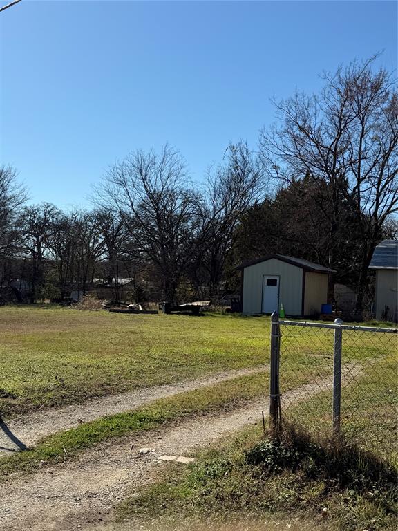 1048 Red Bird Seven Points, TX 75143 - Photo 6 of 28 a front view of a house with a yard