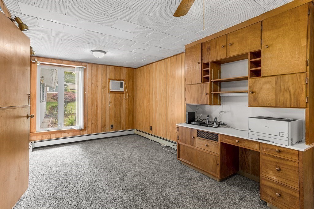 7 Ruth Drive Framingham, MA 01701 - Photo 14 of 33 a kitchen with stainless steel appliances granite countertop a sink and cabinets
