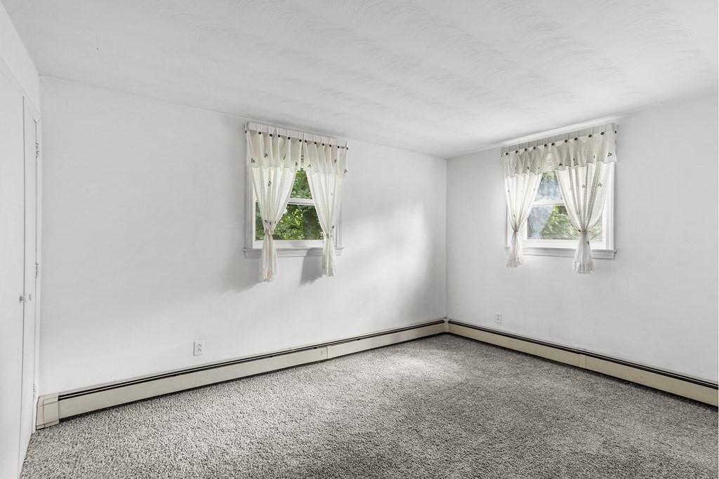 7 Ruth Drive Framingham, MA 01701 - Photo 21 of 33 an empty room with windows