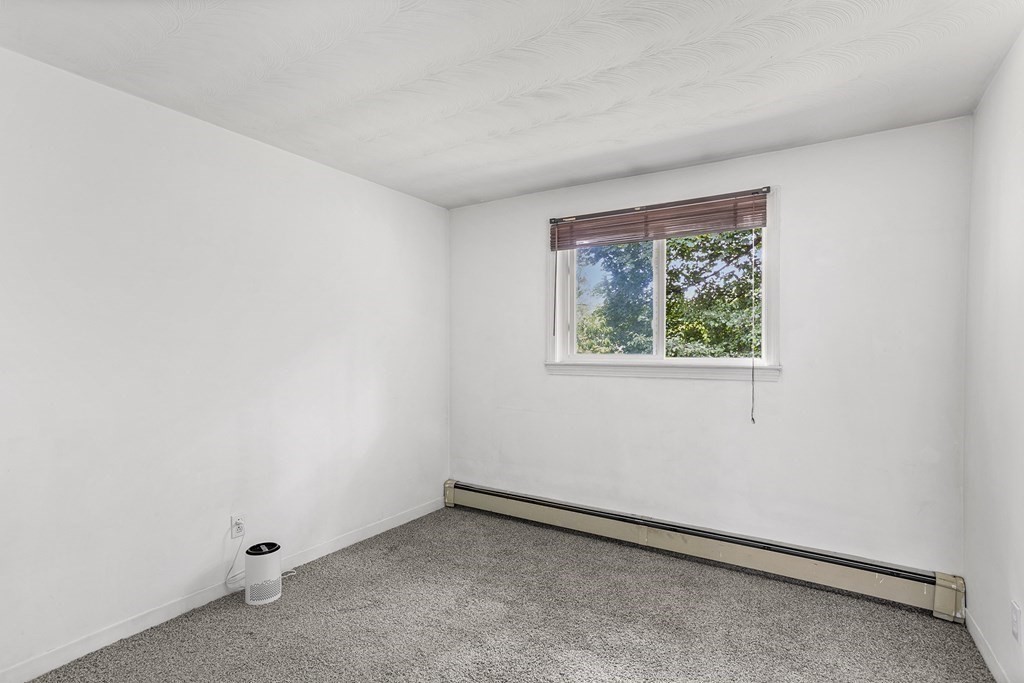 7 Ruth Drive Framingham, MA 01701 - Photo 23 of 33 an empty room with a window
