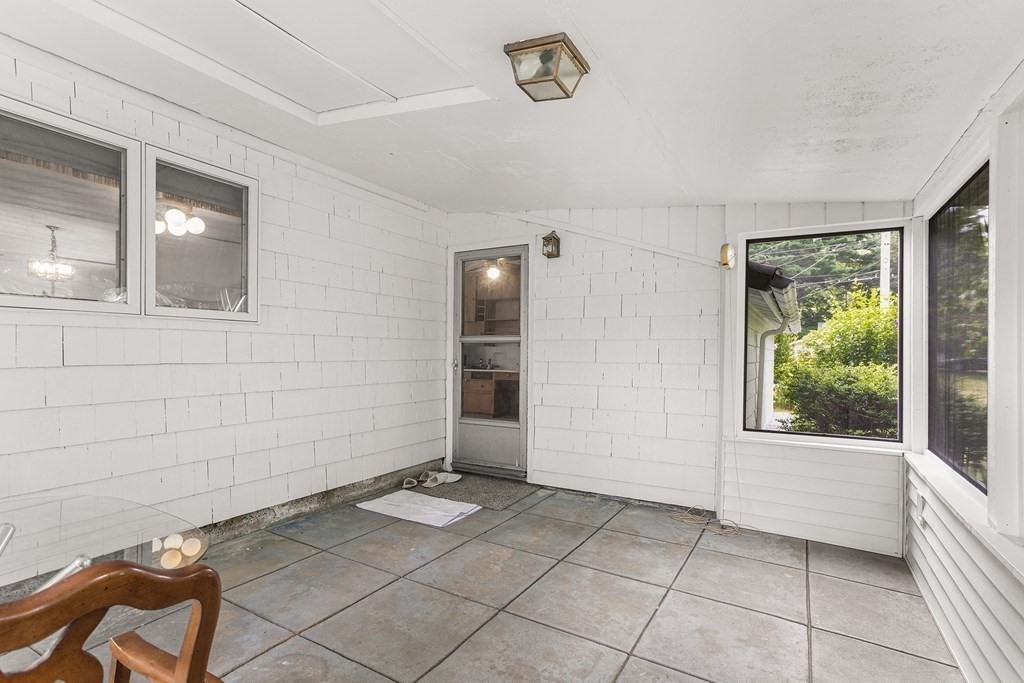 7 Ruth Drive Framingham, MA 01701 - Photo 27 of 33 a view of a livingroom with wooden floor and a window