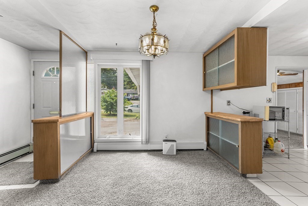 7 Ruth Drive Framingham, MA 01701 - Photo 3 of 33 a very nice looking room with a large window