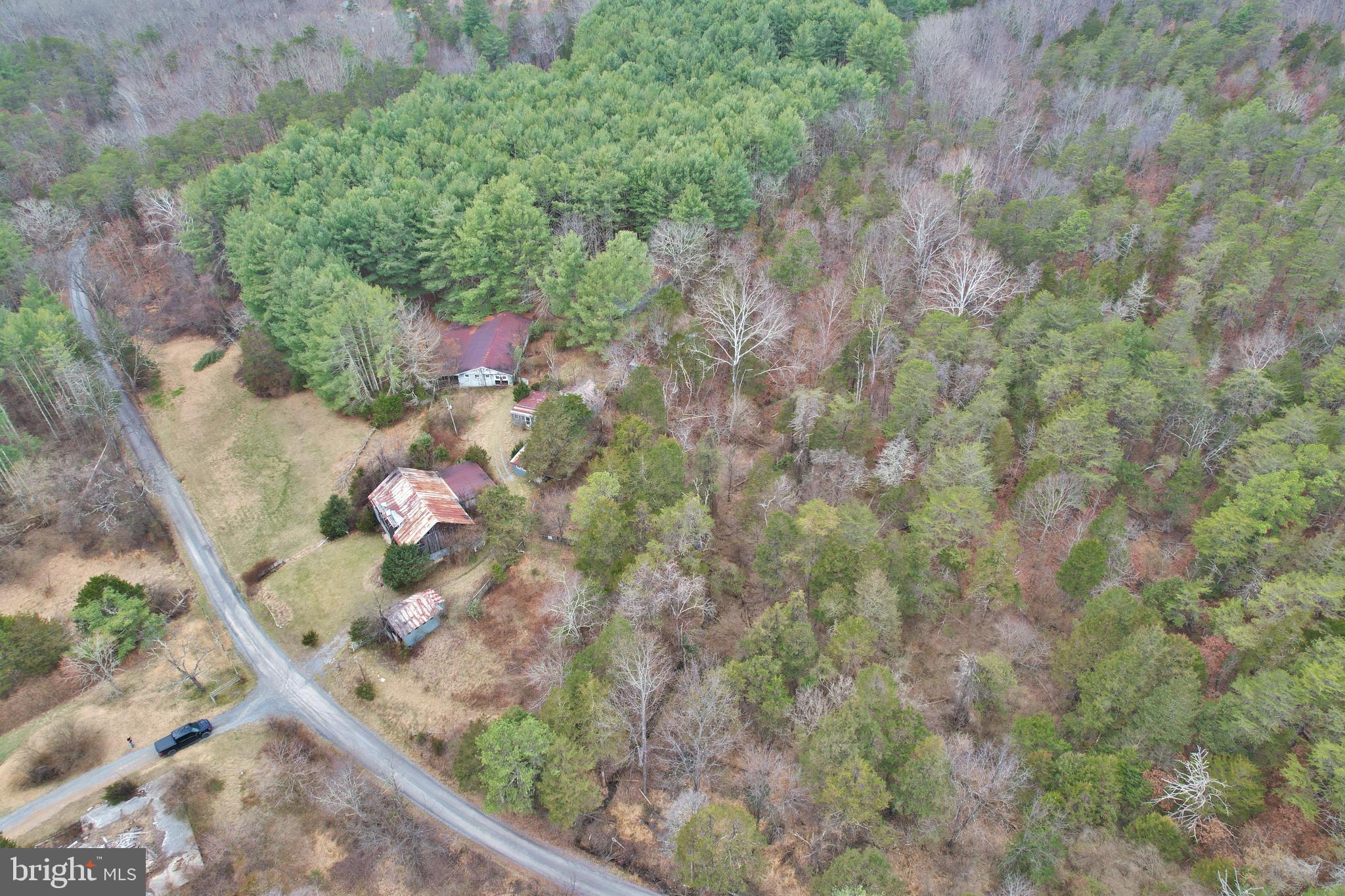 0 Boyer Road Fort Valley, VA 22652 - Photo 21 of 38 a backyard of a house with a yard and outdoor seating
