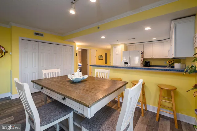 a bedroom with a bed and a lamp