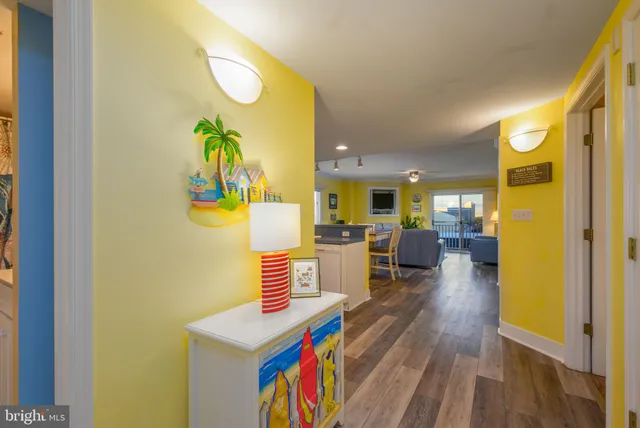 a bedroom with a bed and glass door