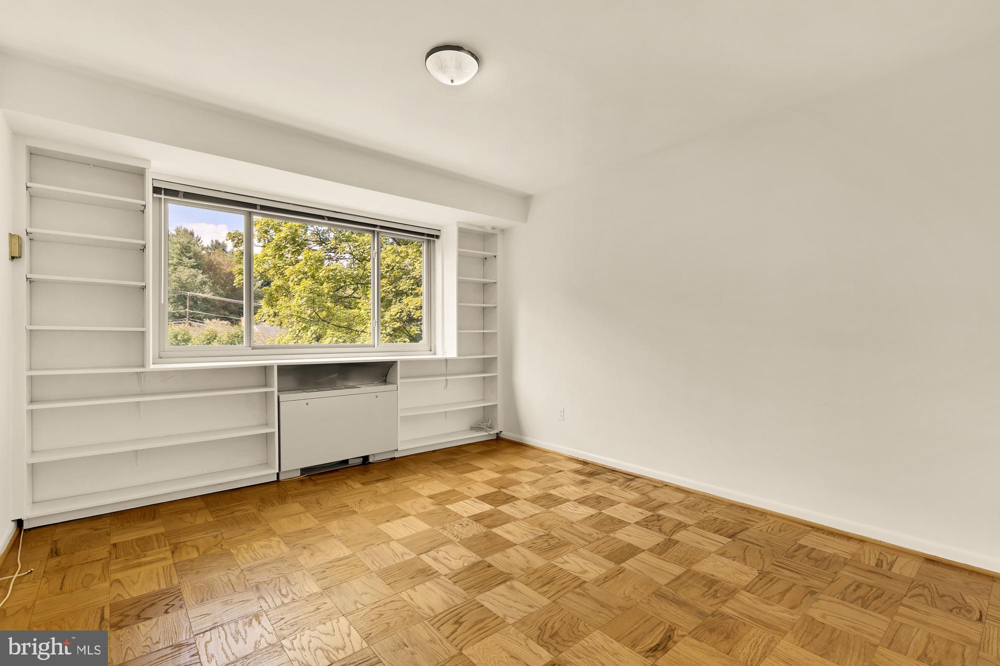 5100 Dorset Avenue, Unit 308 Chevy Chase, MD 20815 - Photo 15 of 31 an empty room with window