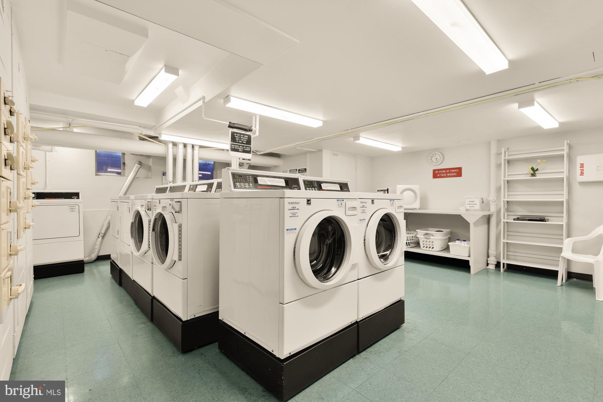 5100 Dorset Avenue, Unit 308 Chevy Chase, MD 20815 - Photo 22 of 31 a utility room with dryer and washer