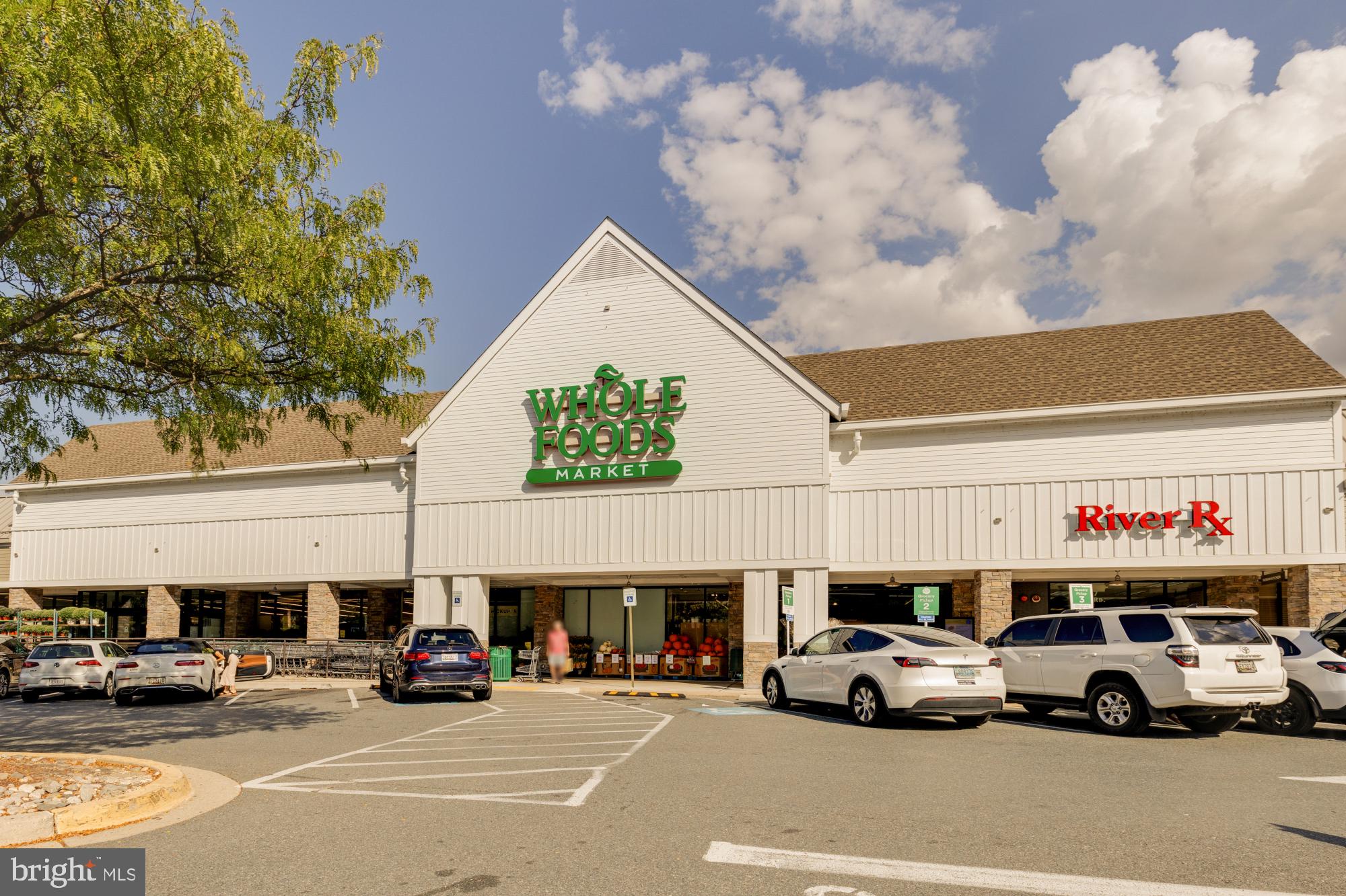 5100 Dorset Avenue, Unit 308 Chevy Chase, MD 20815 - Photo 27 of 31 a view of a cars parked in front of a building