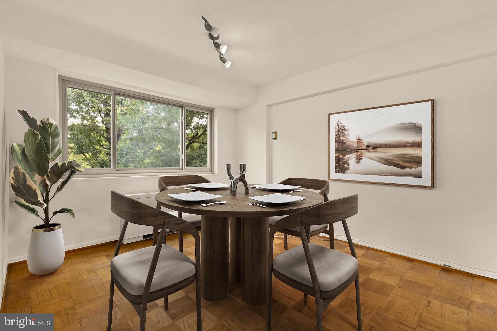 5100 Dorset Avenue, Unit 308 Chevy Chase, MD 20815 - Photo 8 of 31 a view of a livingroom with furniture and window