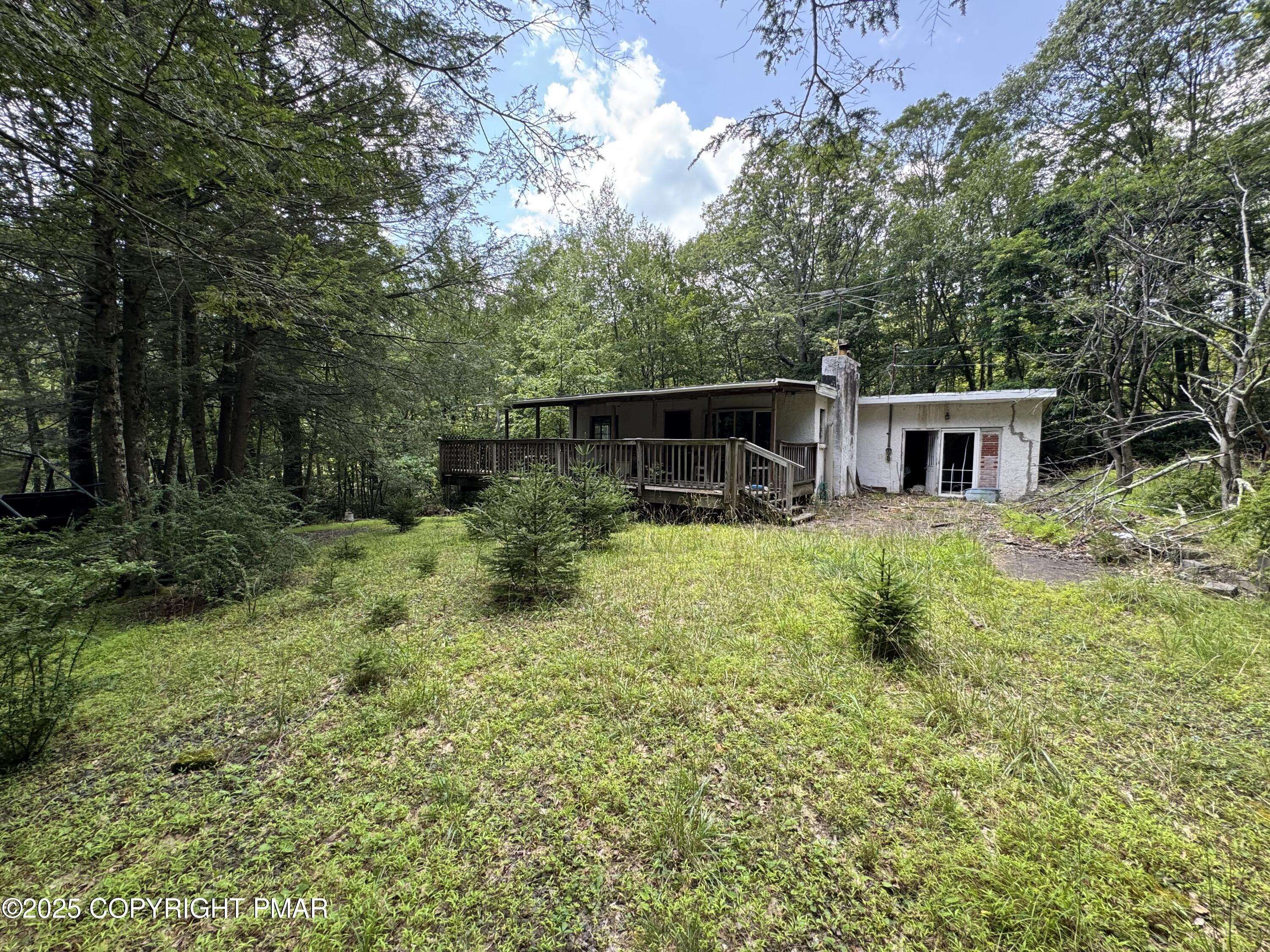 207 North Eastbrook Road Effort, PA 18330 - Photo 2 of 16 a view of a house with backyard and sitting area