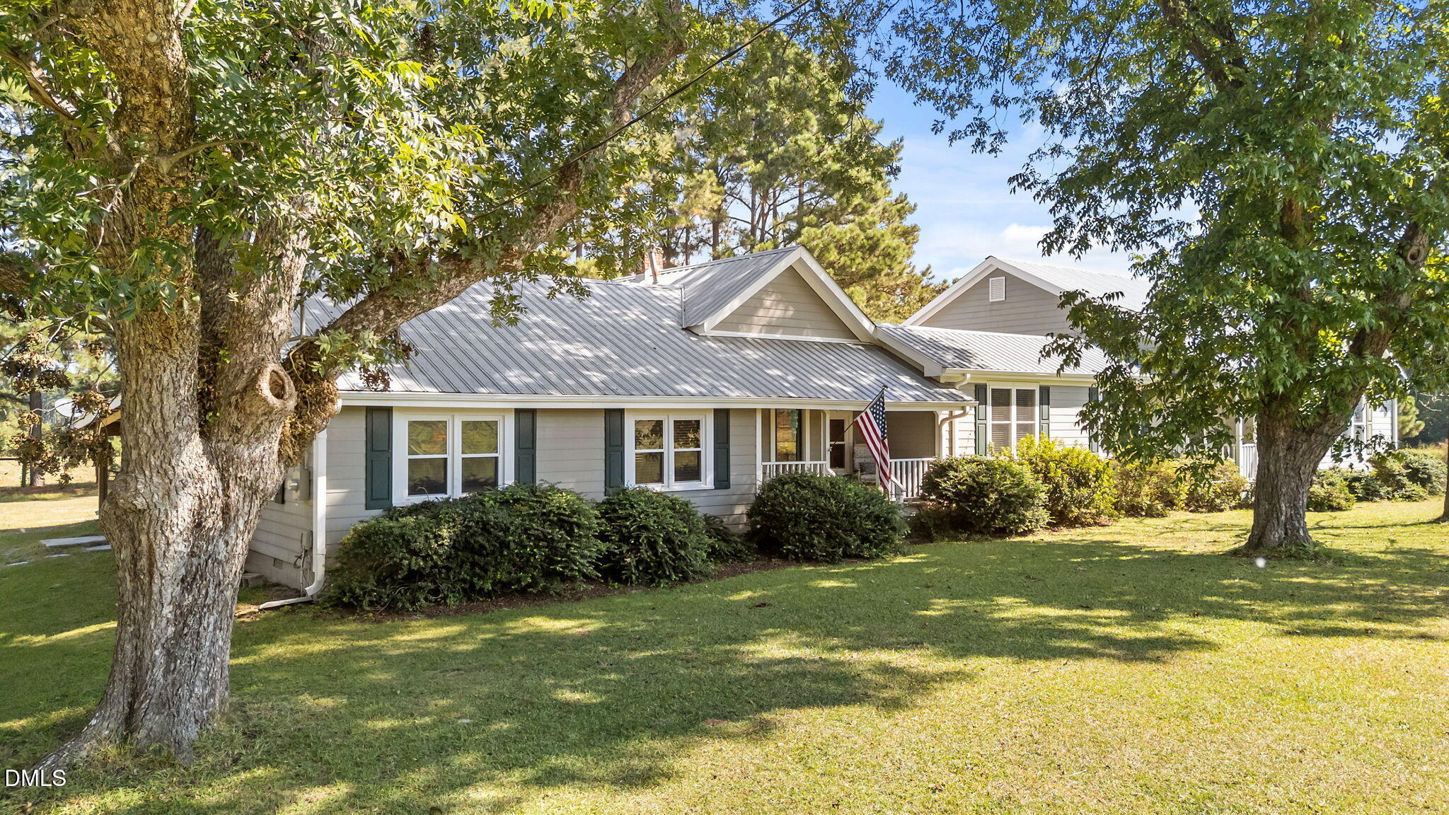 1208 Peach Orchard Road Four Oaks, NC 27524 - Photo 1 of 63 a front view of house with yard and green space