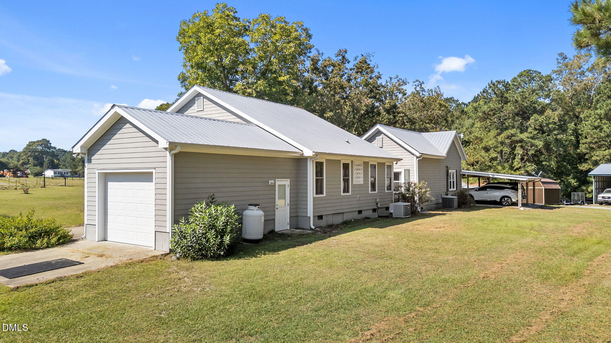1208 Peach Orchard Road Four Oaks, NC 27524 - Photo 12 of 63 19-web-or-mls-DJI_20250919111238_0298_D