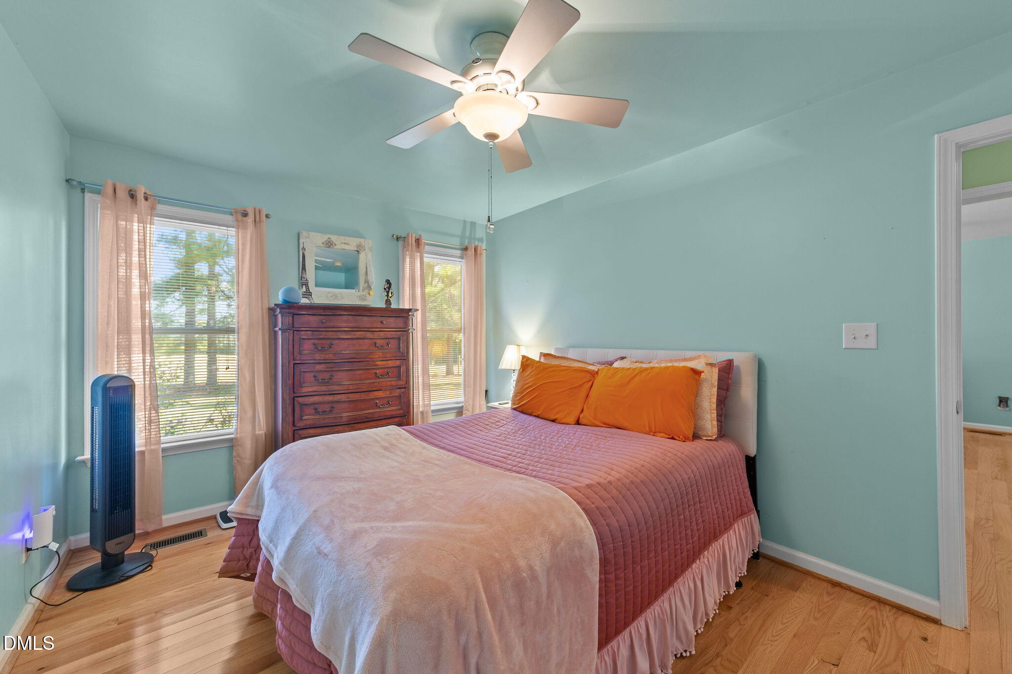 1208 Peach Orchard Road Four Oaks, NC 27524 - Photo 35 of 63 a bedroom with a bed dresser and a window