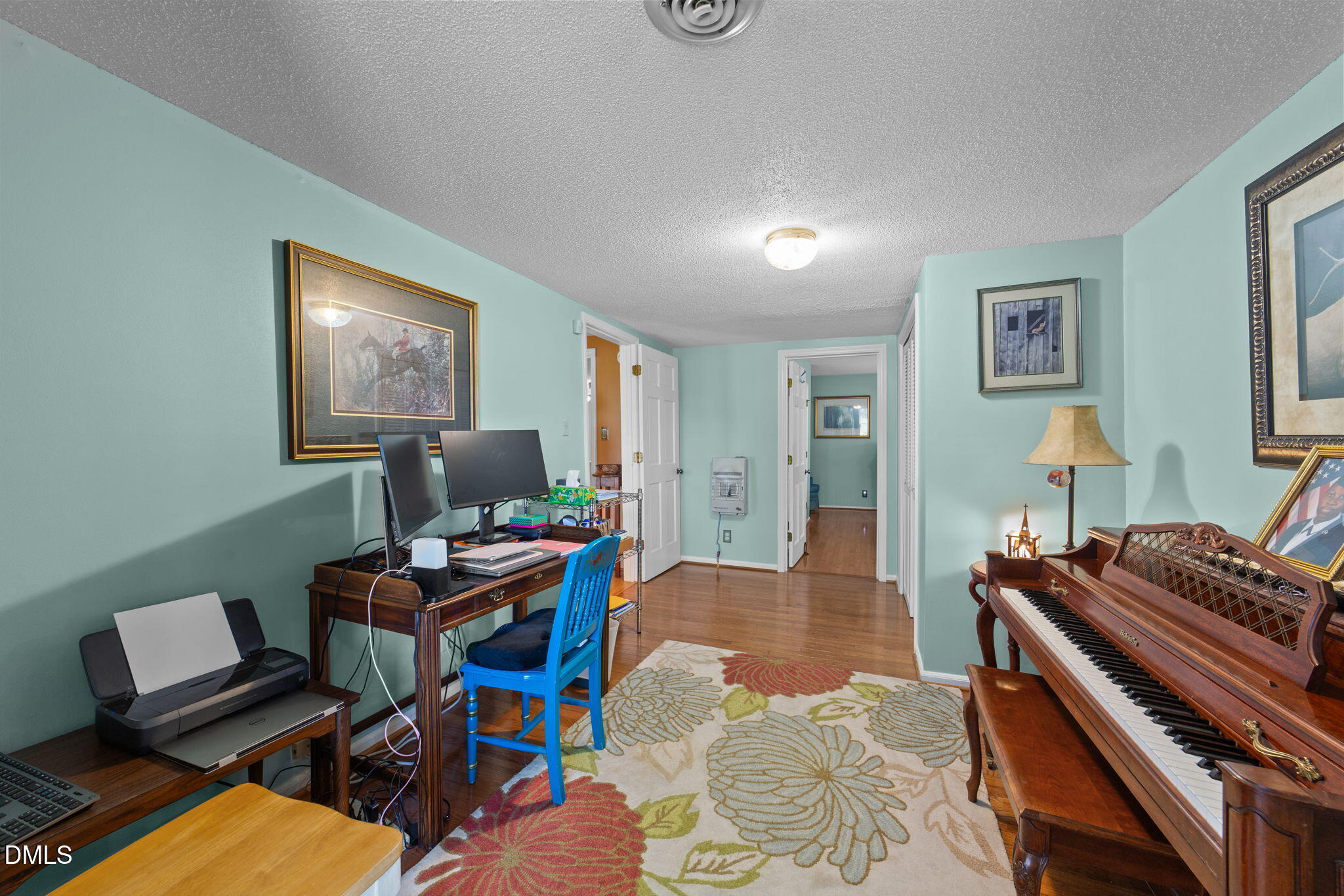 1208 Peach Orchard Road Four Oaks, NC 27524 - Photo 46 of 63 a workspace with furniture and a piano
