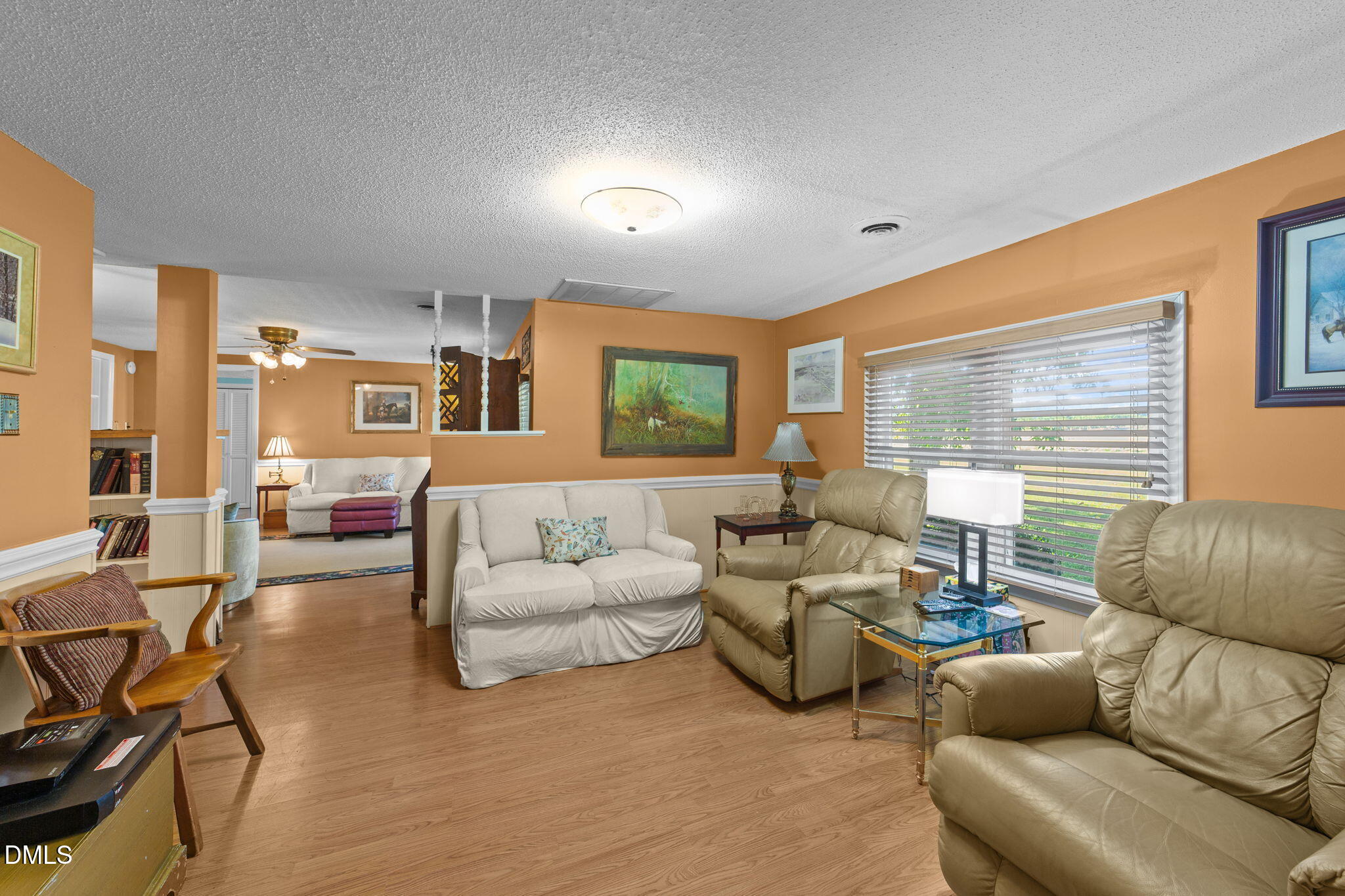 1208 Peach Orchard Road Four Oaks, NC 27524 - Photo 53 of 63 a living room with furniture and a large window