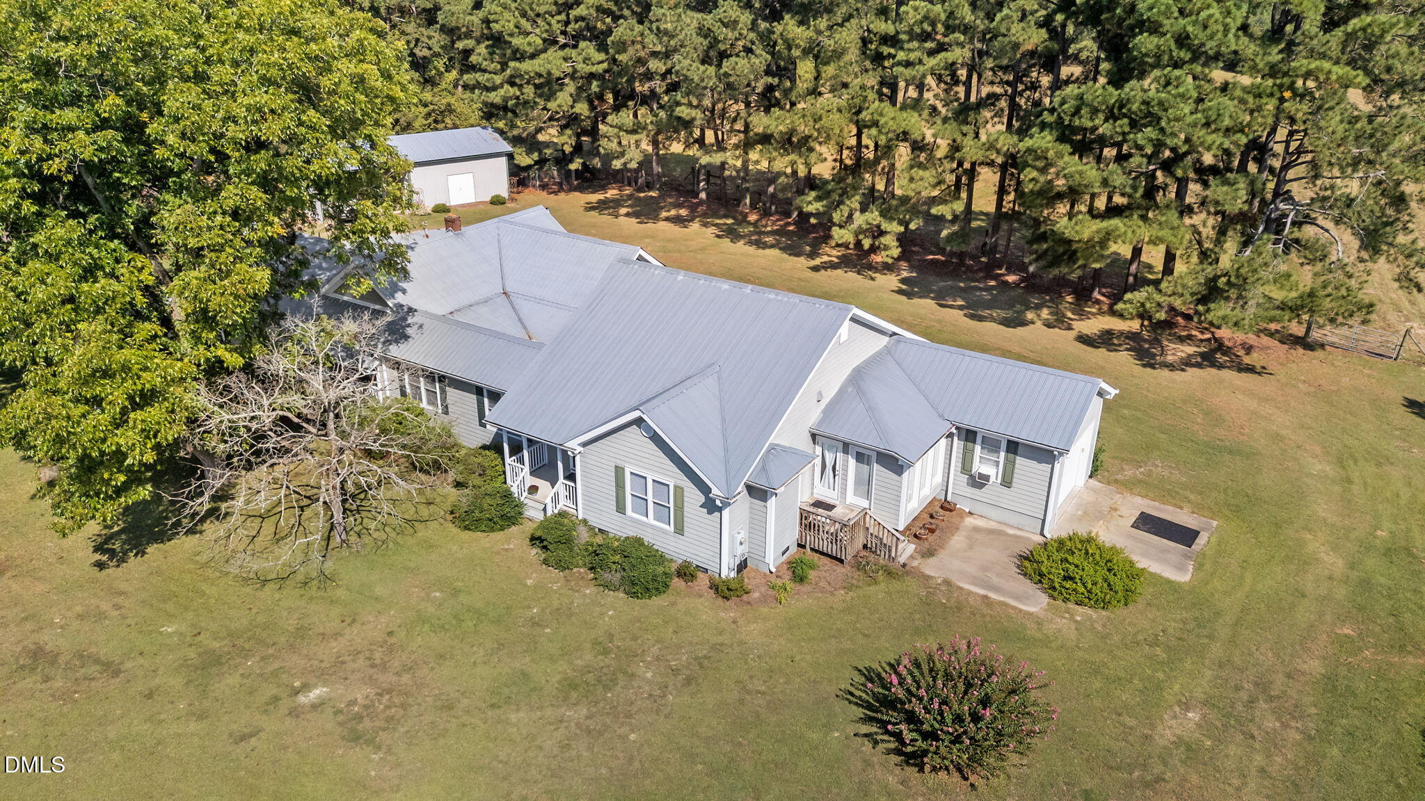 1208 Peach Orchard Road Four Oaks, NC 27524 - Photo 8 of 63 an aerial view of a house with a yard