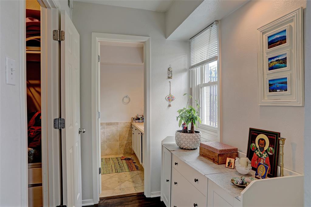 7736 Meadow Road, Unit 102 Dallas, TX 75230 - Photo 15 of 25 Dressing area leading to the primary bath