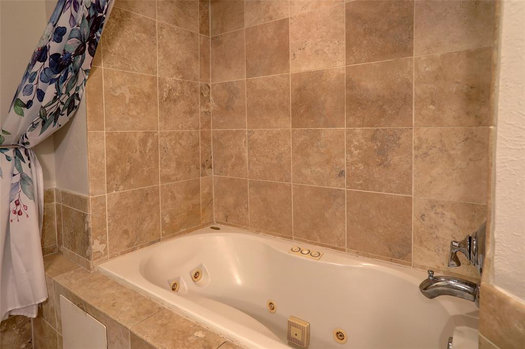 7736 Meadow Road, Unit 102 Dallas, TX 75230 - Photo 20 of 25 Hall bath — large jetted tub