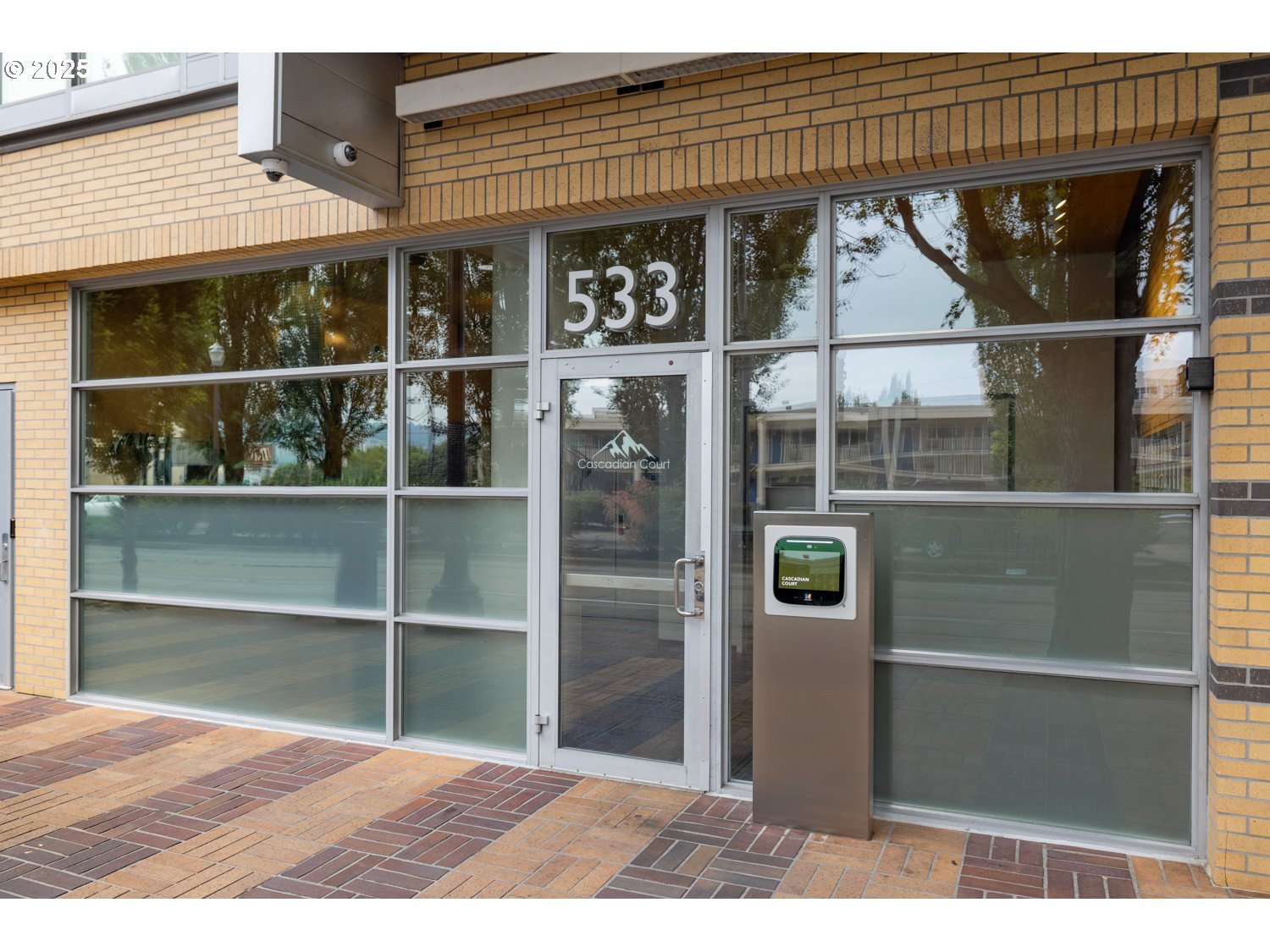 533 Northeast Holladay Street, Unit 601 Portland, OR 97232 - Photo 2 of 25 a view of a brick house with a large window