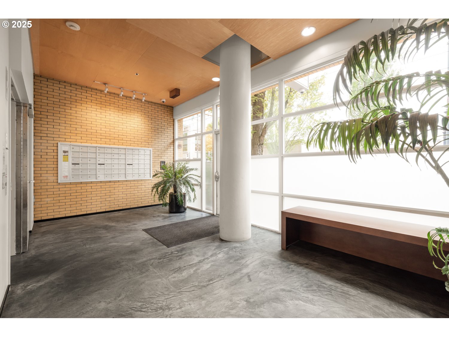 533 Northeast Holladay Street, Unit 601 Portland, OR 97232 - Photo 3 of 25 a view of entryway with wooden floor