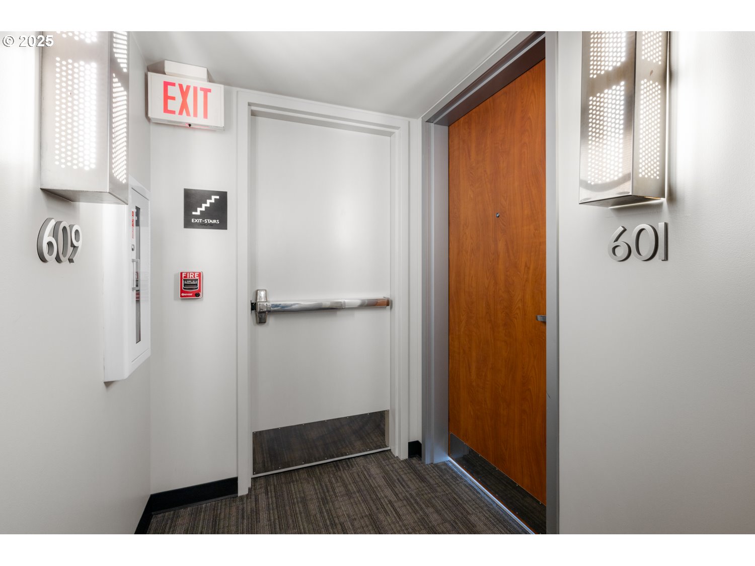 533 Northeast Holladay Street, Unit 601 Portland, OR 97232 - Photo 4 of 25 a bathroom with a shower and a sink
