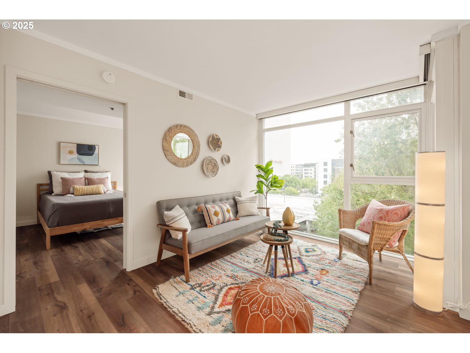 533 Northeast Holladay Street, Unit 601 Portland, OR 97232 - Photo 6 of 25 a living room with furniture and a large window