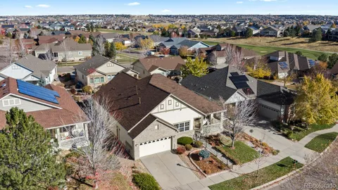 an aerial view of a house with outdoor space