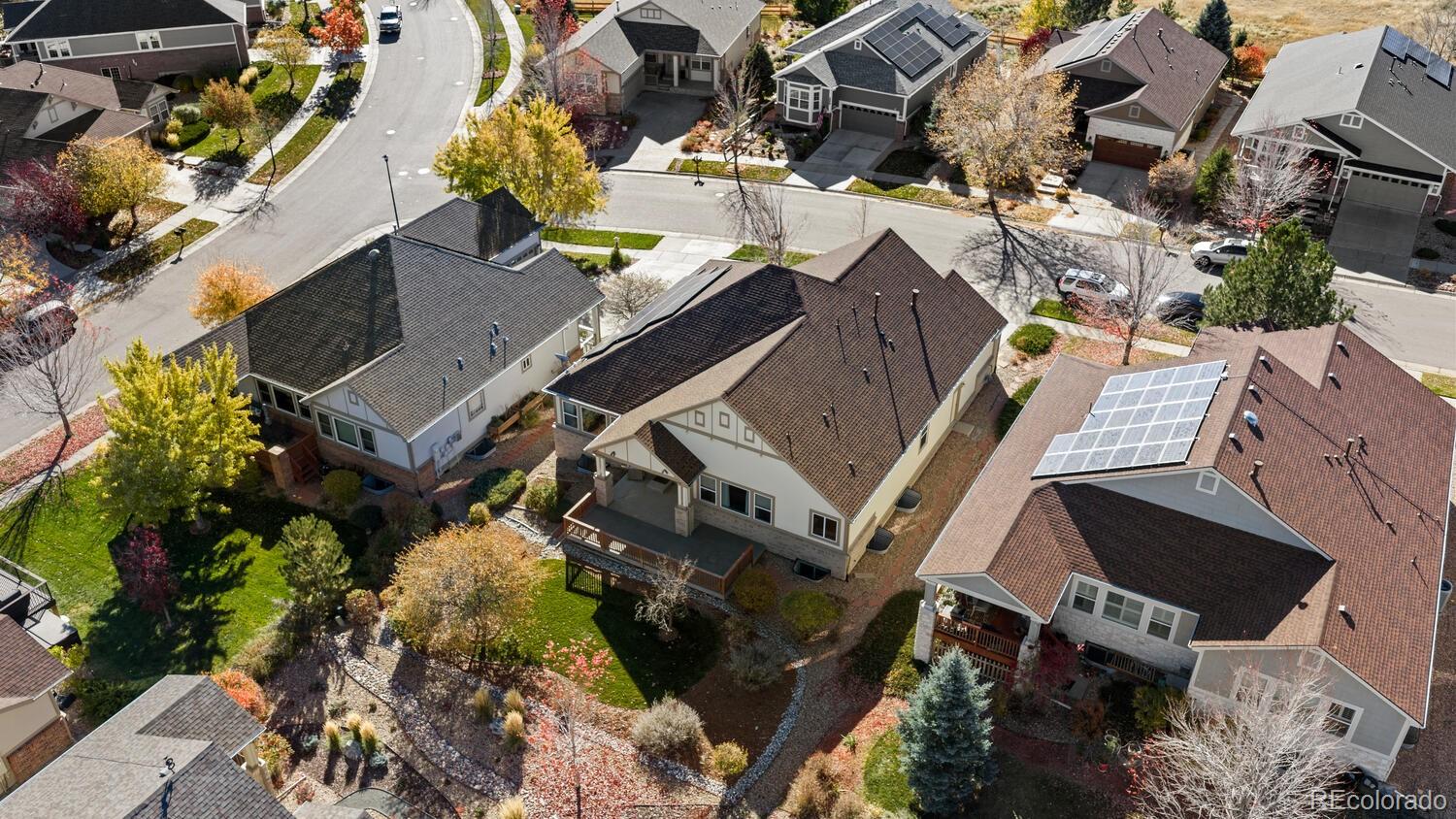 8322 South Quatar Circle Aurora, CO 80016 - Photo 39 of 47 an aerial view of a house with a yard and mountain view