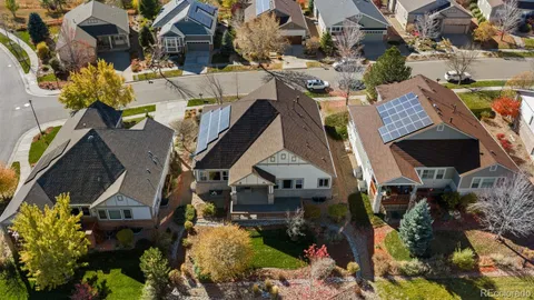 an aerial view of houses with outdoor space