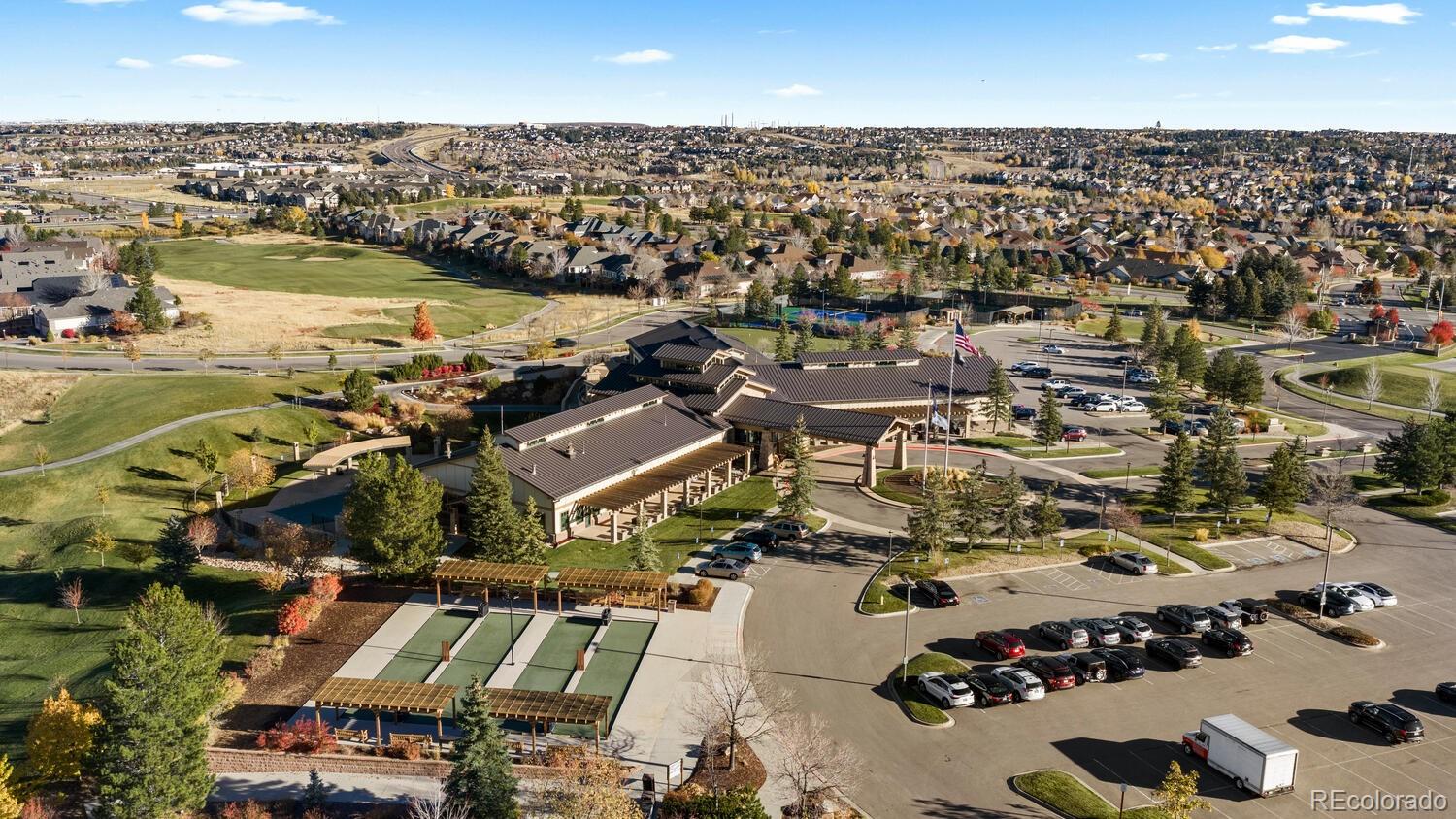 8322 South Quatar Circle Aurora, CO 80016 - Photo 44 of 47 an aerial view of a building with outdoor space