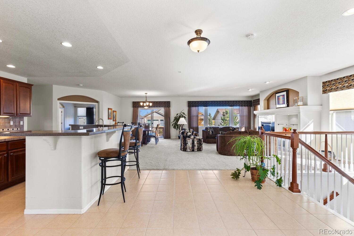8322 South Quatar Circle Aurora, CO 80016 - Photo 5 of 47 a view of a livingroom with furniture and a livingroom
