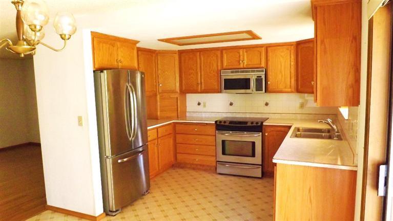 725 South Valley View Road Ashland, OR 97520 - Photo 5 of 18 a kitchen with stainless steel appliances granite countertop a refrigerator a stove and a microwave oven
