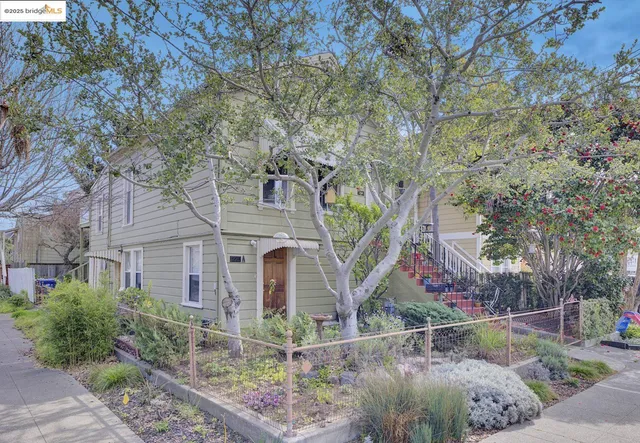 front view of house with a trees