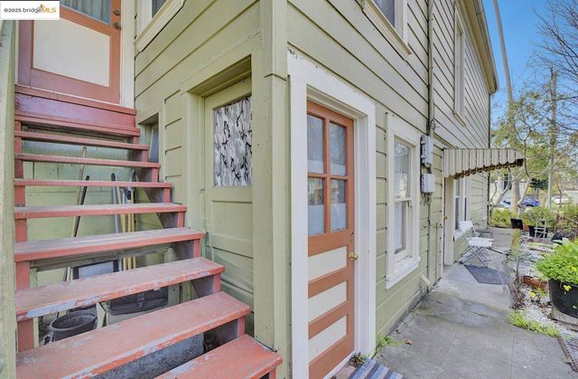 a view of a city from a brick building