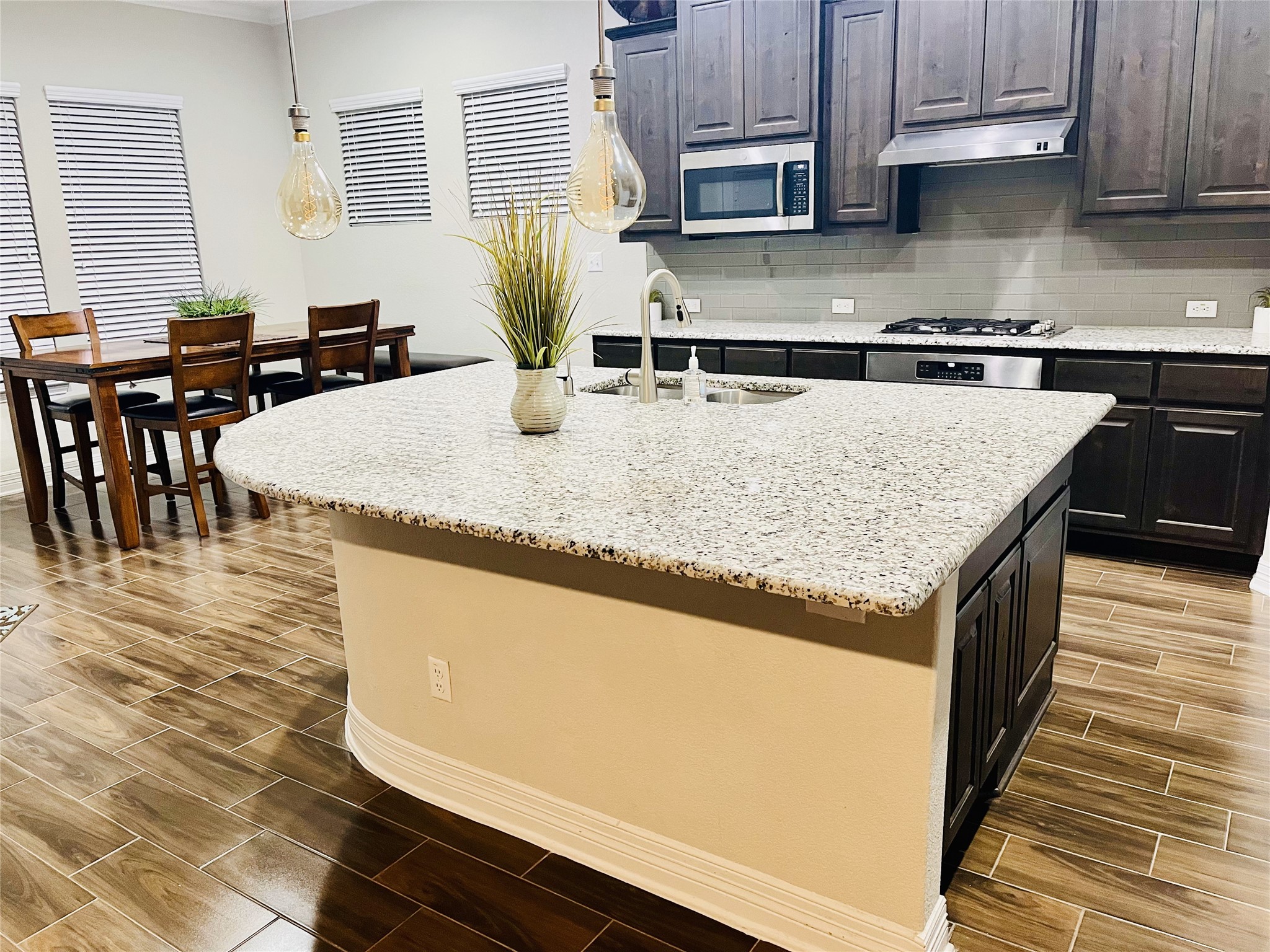 409 Betony Loop Buda, TX 78610 - Photo 6 of 27 Kitchen Island