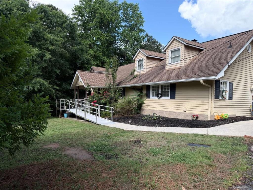1972 Mt Zion Road Oxford, GA 30054 - Photo 3 of 15 a front view of a house with a yard
