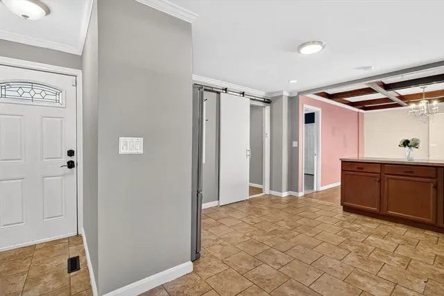 a large bathroom with a shower and a sink