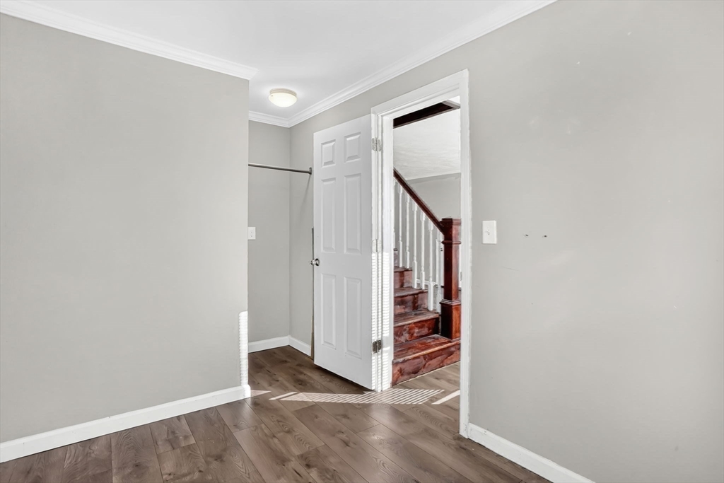 41 Florida Street Springfield, MA 01109 - Photo 27 of 41 a view of a hallway with staircase